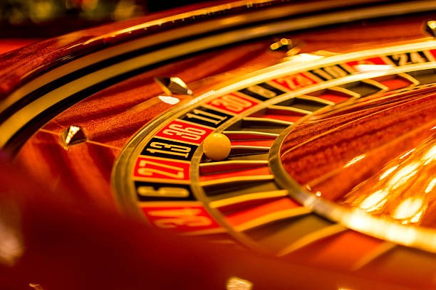 French Roulette wheel and betting layout in live studio